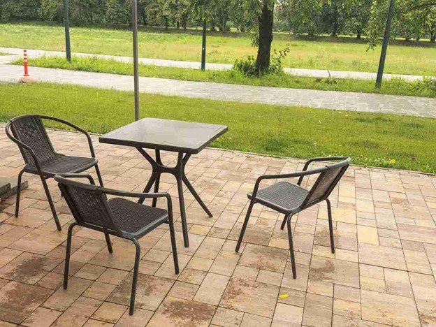 Completed concrete patio with outdoor seating area and clean paver layout in Shaker Heights, OH