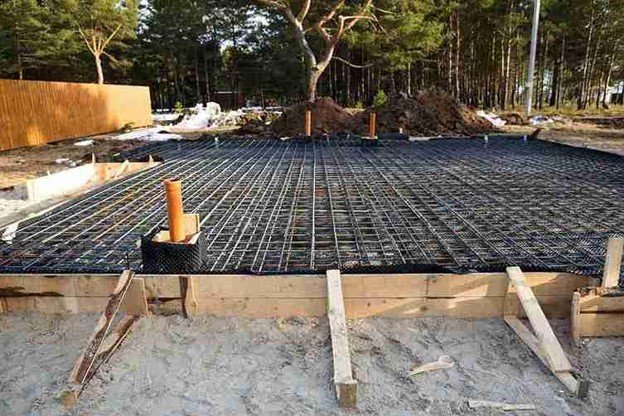 Reinforced concrete slab foundation with steel rebar grid prepared for pouring in Shaker Heights, OH